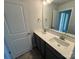 Bathroom with double sink vanity, white quartz countertop and dark gray cabinets at 117 High Rock Ct # 9, Statesville, NC 28677