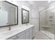 Modern bathroom featuring double sinks, a glass shower, and neutral tile at 126 Adelaide Way, Rock Hill, SC 29732