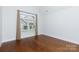 Bright bedroom featuring hardwood floors, a large window, and neutral walls at 126 Adelaide Way, Rock Hill, SC 29732