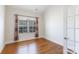 A room features hardwood floors, a window with curtains, and a glass-paneled door at 126 Adelaide Way, Rock Hill, SC 29732