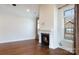 Living room boasting a fireplace, hardwood floors, and ample natural light at 126 Adelaide Way, Rock Hill, SC 29732