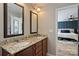 Bathroom featuring double sinks with granite countertops and vanity drawers connected to the bedroom at 12889 Clydesdale Dr # 59, Midland, NC 28107