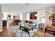 Bright living room featuring modern decor, hardwood floors and lots of natural light at 14946 Shinner Dr, Huntersville, NC 28078