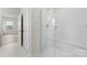 Modern bathroom with a glass-enclosed shower featuring marble tile and chrome fixtures at 2016 Bramble Hedge Rd # 3277, Indian Trail, NC 28079