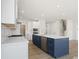 Modern kitchen with a navy island, stainless steel appliances, gas range, and subway tile backsplash at 2016 Bramble Hedge Rd # 3277, Indian Trail, NC 28079
