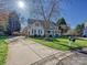 Charming two-story home with a well-manicured lawn and a long driveway at 20313 Queensdale Dr, Cornelius, NC 28031