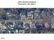 Aerial view of 2101 Sharon Avenue showing surrounding houses and landscaping in the upscale neighborhood at 2101 Sharon Ave, Charlotte, NC 28211