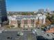 Apartment building with street view from above parking lot, offering urban living convenience at 300 W 5Th St # 344, Charlotte, NC 28202