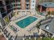 Inviting outdoor pool surrounded by lounge chairs and lush landscaping, creating a relaxing oasis at 300 W 5Th St # 344, Charlotte, NC 28202