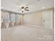 Expansive bedroom with plenty of natural light, neutral walls, and a ceiling fan for added comfort at 4006 Sincerity Rd, Monroe, NC 28110