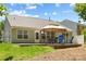 View of a home's backyard, featuring an expansive deck and patio area for relaxation at 4323 Wiregrass Rd, Indian Land, SC 29707