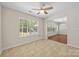 Sunlit dining area with tile floors and a view to the back patio at 4323 Wiregrass Rd, Indian Land, SC 29707