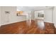 Hardwood floors throughout the living area showcasing an open floor plan at 4323 Wiregrass Rd, Indian Land, SC 29707