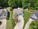 Aerial view of home in a manicured yard with a long driveway at 4323 Wiregrass Rd, Indian Land, SC 29707