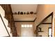 Bright hallway featuring a staircase leading to the upper level of the house at 4626 Annerly Ct, Charlotte, NC 28226