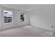 A bedroom features two windows offering ample natural light, enhancing the room's spacious feel at 515 Harrel St, Salisbury, NC 28144