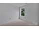 Unfinished bedroom with a window at 515 Harrel St, Salisbury, NC 28144
