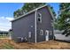 The side elevation presents a modern appeal with a newly installed AC unit and vinyl siding at 515 Harrel St, Salisbury, NC 28144