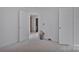 Hallway showing an adjacent unfinished bathroom at 515 Harrel St, Salisbury, NC 28144