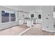 Bright, unfinished kitchen with white cabinets, granite countertops, and modern fixtures at 515 Harrel St, Salisbury, NC 28144