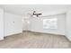 Bright living room with ample sunlight, neutral walls, and wood-look flooring, perfect for relaxing or entertaining at 515 Harrel St, Salisbury, NC 28144