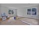 Bright unfinished living room with large windows providing lots of natural light at 515 Harrel St, Salisbury, NC 28144