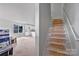 View of stairs, kitchen, and adjacent room under construction at 515 Harrel St, Salisbury, NC 28144