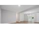 Open concept living space featuring new flooring, fresh paint, and recessed lighting at 5316 Rupert Ln, Charlotte, NC 28215