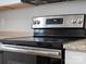 Close-up of a stainless steel oven with a granite countertop at 5316 Rupert Ln, Charlotte, NC 28215