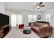 Bright, airy living room with modern furniture and floor-to-ceiling curtains at 5524 Howard St, Charlotte, NC 28269