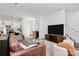 Modern living room with an open floor plan and staircase at 5524 Howard St, Charlotte, NC 28269