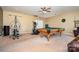 Finished basement space showcasing a pool table, workout area, and ample room for recreation at 615 Vega Nw St, Concord, NC 28027