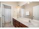 Well-lit bathroom with a double sink vanity and a separate toilet and shower area at 615 Vega Nw St, Concord, NC 28027