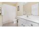 Bright bathroom with a white vanity, commode, and a shower featuring a white curtain at 615 Vega Nw St, Concord, NC 28027