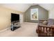 Comfortable bedroom featuring neutral carpet, tv, and a window view at 615 Vega Nw St, Concord, NC 28027