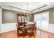 Elegant dining room with dark wood furniture and a sophisticated chandelier at 615 Vega Nw St, Concord, NC 28027