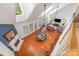Open concept living room with vaulted ceilings, fireplace, and hardwood floors at 615 Vega Nw St, Concord, NC 28027