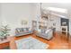 Open-concept living space featuring hardwood floors, high ceilings, seamlessly flowing into the kitchen at 615 Vega Nw St, Concord, NC 28027