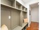 Custom mudroom offers built-in shelving, seating, and storage for organization and convenience at 615 Vega Nw St, Concord, NC 28027