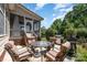 Outdoor patio with comfortable seating and barbecue grill, perfect for grilling and enjoying outdoor meals at 615 Vega Nw St, Concord, NC 28027