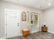 Bright foyer showcasing modern flooring, white trim, and a view of the front yard at 619 N Skyland Dr, Mount Pleasant, NC 28124