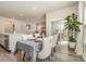 Bright dining area connecting living space and outdoor patio at 6419 Cambridge Dr, Harrisburg, NC 28075