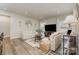 Bright living room with modern furniture and recessed lighting at 6419 Cambridge Dr, Harrisburg, NC 28075