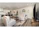 Spacious living room with a view of the modern kitchen at 6419 Cambridge Dr, Harrisburg, NC 28075