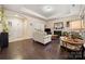 Spacious living room featuring hardwood floors, a fireplace, and neutral furnishings at 7909 Parknoll Dr, Huntersville, NC 28078