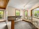 Bright breakfast nook featuring a counter with barstools and natural light from surrounding windows at 9009 Stourbridge Dr, Huntersville, NC 28078
