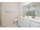 Bright, modern bathroom with double vanity, white cabinets, and a glass-enclosed shower for a spa-like experience at 108 Helm Ln # B, Mooresville, NC 28117