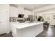 Modern kitchen with white cabinetry, stainless steel appliances, and a spacious center island at 108 Helm Ln, Mooresville, NC 28117