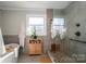 Modern bathroom with a freestanding tub and a luxurious glass-enclosed shower at 108 N Oakwood Dr, Kings Mountain, NC 28086