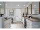 Well-lit bathroom featuring dual vanities and sleek mirrors at 108 N Oakwood Dr, Kings Mountain, NC 28086